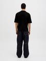 JORVARENNA KNIT SS SPLIT NECK L Locker geschnitten - Black