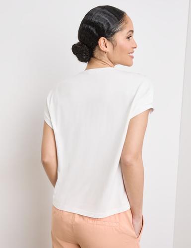 Blusenshirt mit Material-Patch 38 Bequeme Passform - Ecru/weiss/rot/orange Druck
